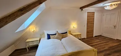 Ein Bett oder Betten in einem Zimmer der Unterkunft Sisi's Loft - Imperial Charm