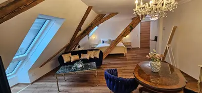 Ein Sitzbereich in der Unterkunft Sisi's Loft - Imperial Charm