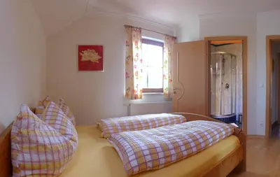 Ein Bett oder Betten in einem Zimmer der Unterkunft Ferienhaus-Birgit-Gerald-Reinbacher