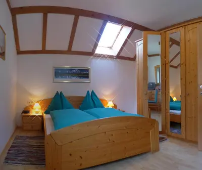 Ein Bett oder Betten in einem Zimmer der Unterkunft Ferienhaus-Birgit-Gerald-Reinbacher