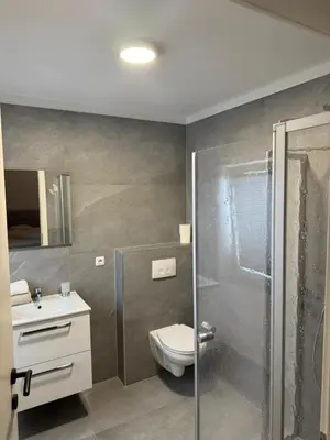 Ein Badezimmer in der Unterkunft ALS Zimmer & Suiten