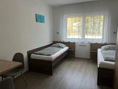 Ein Bett oder Betten in einem Zimmer der Unterkunft FarawayHomes Aparthotel Krems