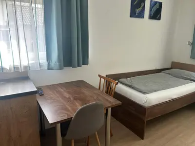 Ein Bett oder Betten in einem Zimmer der Unterkunft FarawayHomes Aparthotel Krems