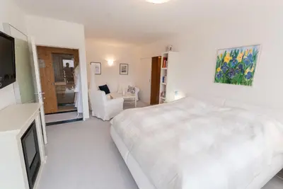 Ein Bett oder Betten in einem Zimmer der Unterkunft Modern Living Traditional Style