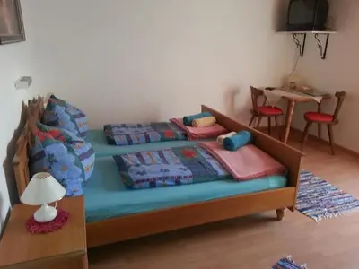 Ein Bett oder Betten in einem Zimmer der Unterkunft Osterbichlerhof