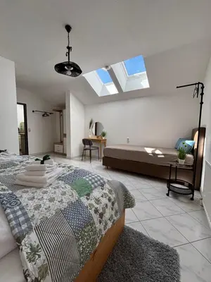 Ein Bett oder Betten in einem Zimmer der Unterkunft Apartment Theresa