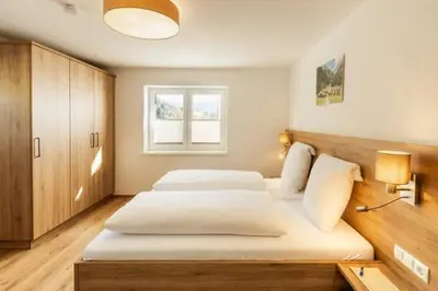 Ein Bett oder Betten in einem Zimmer der Unterkunft Landhaus im Feld