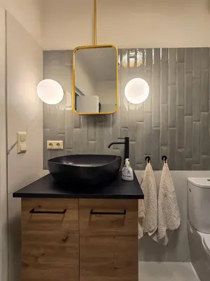 Ein Badezimmer in der Unterkunft Ausseer AusZeit - beim Meranplatz