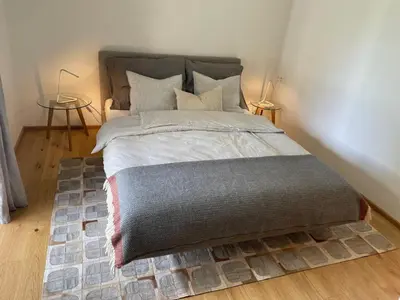 Ein Bett oder Betten in einem Zimmer der Unterkunft Alpine Retreat