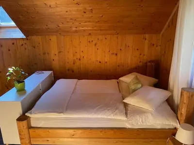 Ein Bett oder Betten in einem Zimmer der Unterkunft Haus Bergblick