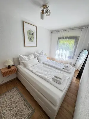 Ein Bett oder Betten in einem Zimmer der Unterkunft Bergbrise Obertraun