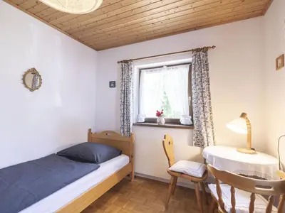 Ein Bett oder Betten in einem Zimmer der Unterkunft Holiday Home Landhaus Rittisweid by Interhome