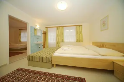 Ein Bett oder Betten in einem Zimmer der Unterkunft Ferienhaus Hermann