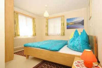 Ein Bett oder Betten in einem Zimmer der Unterkunft Ferienhaus Hermann