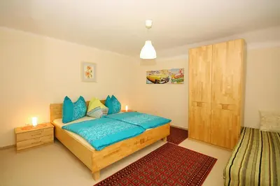 Ein Bett oder Betten in einem Zimmer der Unterkunft Ferienhaus Hermann