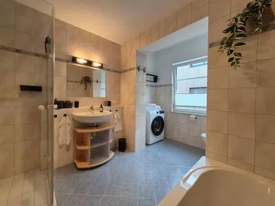 Ein Badezimmer in der Unterkunft Apartment East