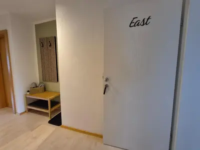Ein Bett oder Betten in einem Zimmer der Unterkunft Apartment East