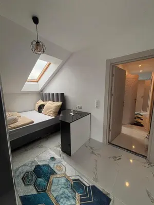 Ein Bett oder Betten in einem Zimmer der Unterkunft SC Apartments Bad Goisern - contactless check in