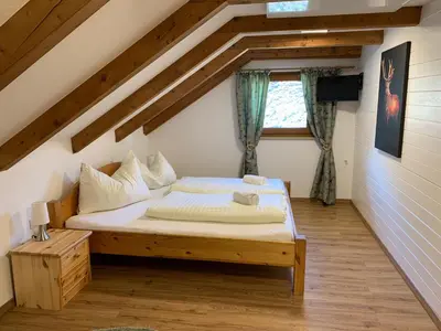 Ein Bett oder Betten in einem Zimmer der Unterkunft Riegleralm