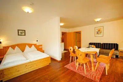 Ein Bett oder Betten in einem Zimmer der Unterkunft Haus Hubertus by Summit Travel
