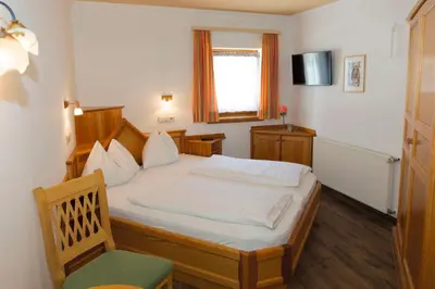 Ein Bett oder Betten in einem Zimmer der Unterkunft Haus Hubertus by Summit Travel