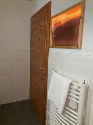 Ein Bett oder Betten in einem Zimmer der Unterkunft Ferienwohnung Mondsee-Irrsee