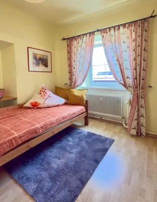 Ein Bett oder Betten in einem Zimmer der Unterkunft Haus Elfie