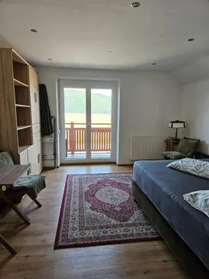 Ein Bett oder Betten in einem Zimmer der Unterkunft Appartement Traunsteinblick