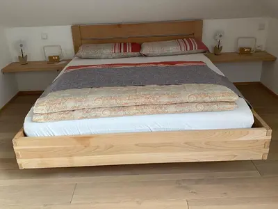 Ein Bett oder Betten in einem Zimmer der Unterkunft Ferienwohnung Moser