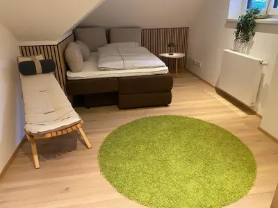 Ein Bett oder Betten in einem Zimmer der Unterkunft Ferienwohnung Moser