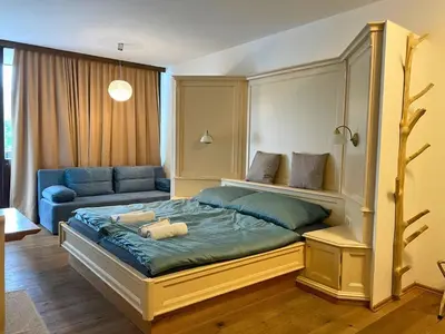 Ein Bett oder Betten in einem Zimmer der Unterkunft Ridge & Hide Bad Goisern
