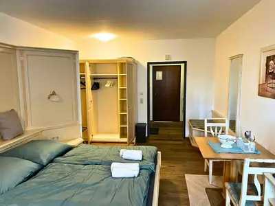 Ein Bett oder Betten in einem Zimmer der Unterkunft Ridge & Hide Bad Goisern