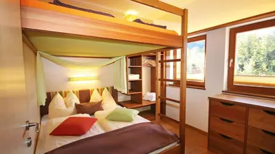 Ein Bett oder Betten in einem Zimmer der Unterkunft Alpin Chalet Wagrain