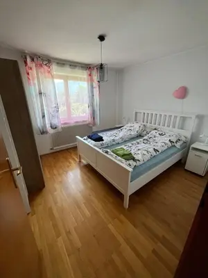 Ein Bett oder Betten in einem Zimmer der Unterkunft Ferienhaus Moser mit Pool