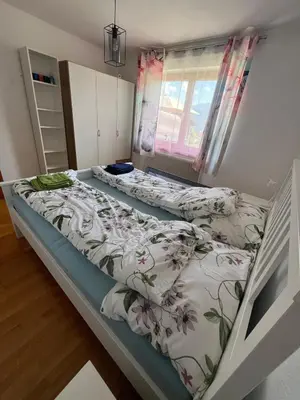 Ein Bett oder Betten in einem Zimmer der Unterkunft Ferienhaus Moser mit Pool