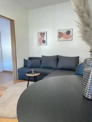 Ein Sitzbereich in der Unterkunft Zentrale Wohnung mit Georgenblick