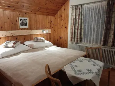 Ein Bett oder Betten in einem Zimmer der Unterkunft Ferienhaus zur Birke