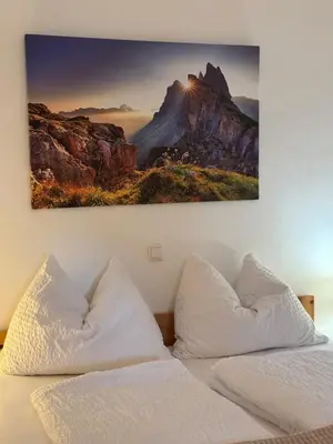 Ein Bett oder Betten in einem Zimmer der Unterkunft Ferienwohnung Zinkenblick