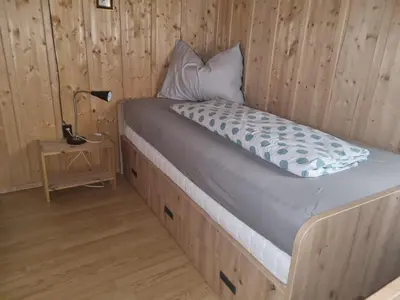 Ein Bett oder Betten in einem Zimmer der Unterkunft Ferienchalet Murau Blick