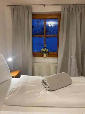 Ein Bett oder Betten in einem Zimmer der Unterkunft Chalet Zauberflöte
