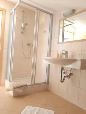 Ein Badezimmer in der Unterkunft Bauernhof Burglehen