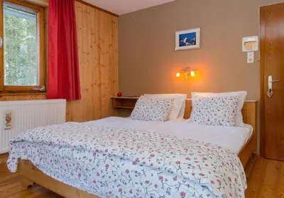 Ein Bett oder Betten in einem Zimmer der Unterkunft Haus Bergblick