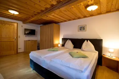 Ein Bett oder Betten in einem Zimmer der Unterkunft Gasthof Kirchmoar