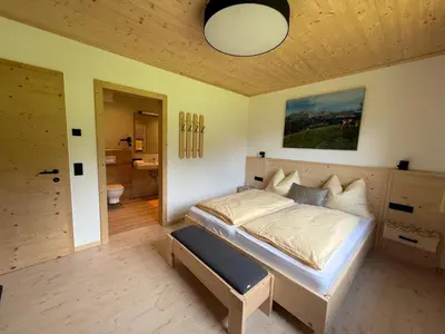 Ein Bett oder Betten in einem Zimmer der Unterkunft Naturchalet Forster