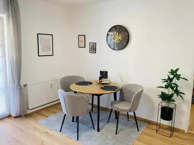 Ein Sitzbereich in der Unterkunft Apartment beim Schloss Ort mit Balkon und Parkplatz