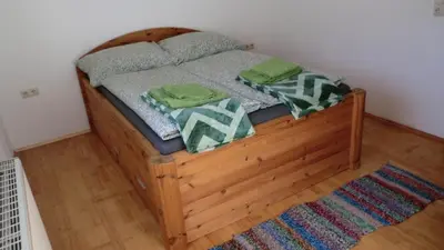 Ein Bett oder Betten in einem Zimmer der Unterkunft Ferienhaus Nest