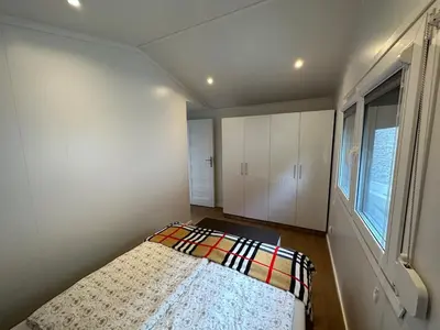 Ein Bett oder Betten in einem Zimmer der Unterkunft Premium Chalet B, close to the lake, quiet location