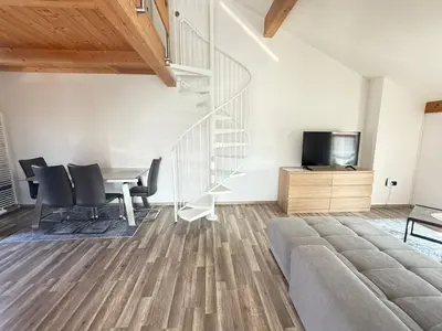 Ein Sitzbereich in der Unterkunft Wohnung in Schwanenstadt