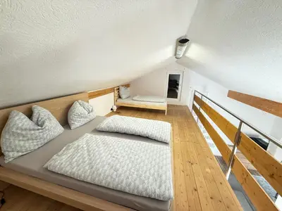 Ein Bett oder Betten in einem Zimmer der Unterkunft Wohnung in Schwanenstadt
