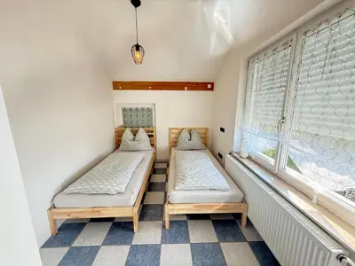 Ein Bett oder Betten in einem Zimmer der Unterkunft Wohnung in Schwanenstadt